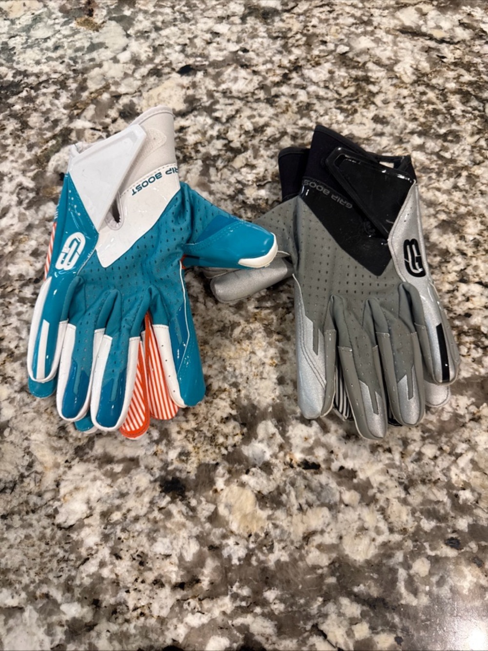 2 Pair of Gray and Teal Football Grip Boost Gloves - Logo Visible